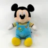 Disney - Mickey La Souris - Peluche Salopette Bleu Oiseau 25 Cm